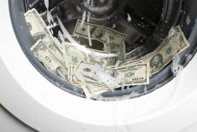 bigstock Laundering of dirty money in w 106958255 400x267 - ЦБ пояснил, зачем в России ввели контроль наличных расчетов