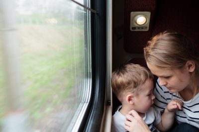 mother and son on a train trip free photo 400x267 - В Россию прибыли более 40 тысяч беженцев из Донбасса